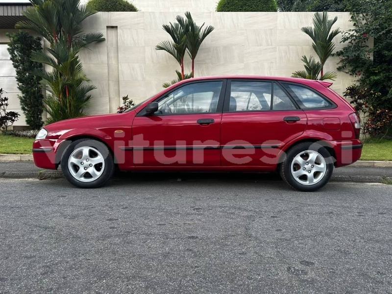 Big with watermark mazda 323 abidjan abidjan 42177