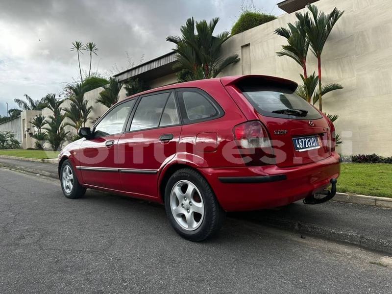 Big with watermark mazda 323 abidjan abidjan 42177